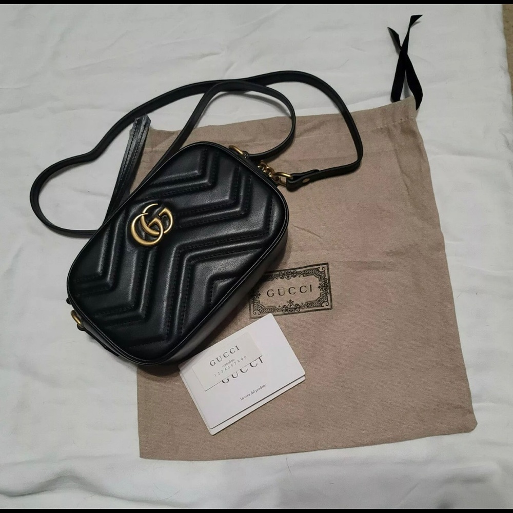 Authentic Gucci Black Marmont Mini Bag. Used literally once.